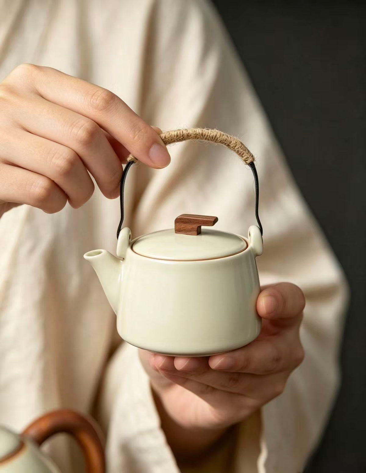 Still Ataraxia Ru Kiln side-handle teapot set in Bean Yellow with travel case